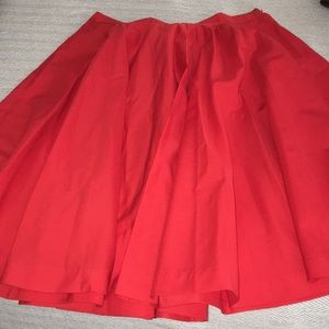 Red Skirt with pockets. Size Small.
